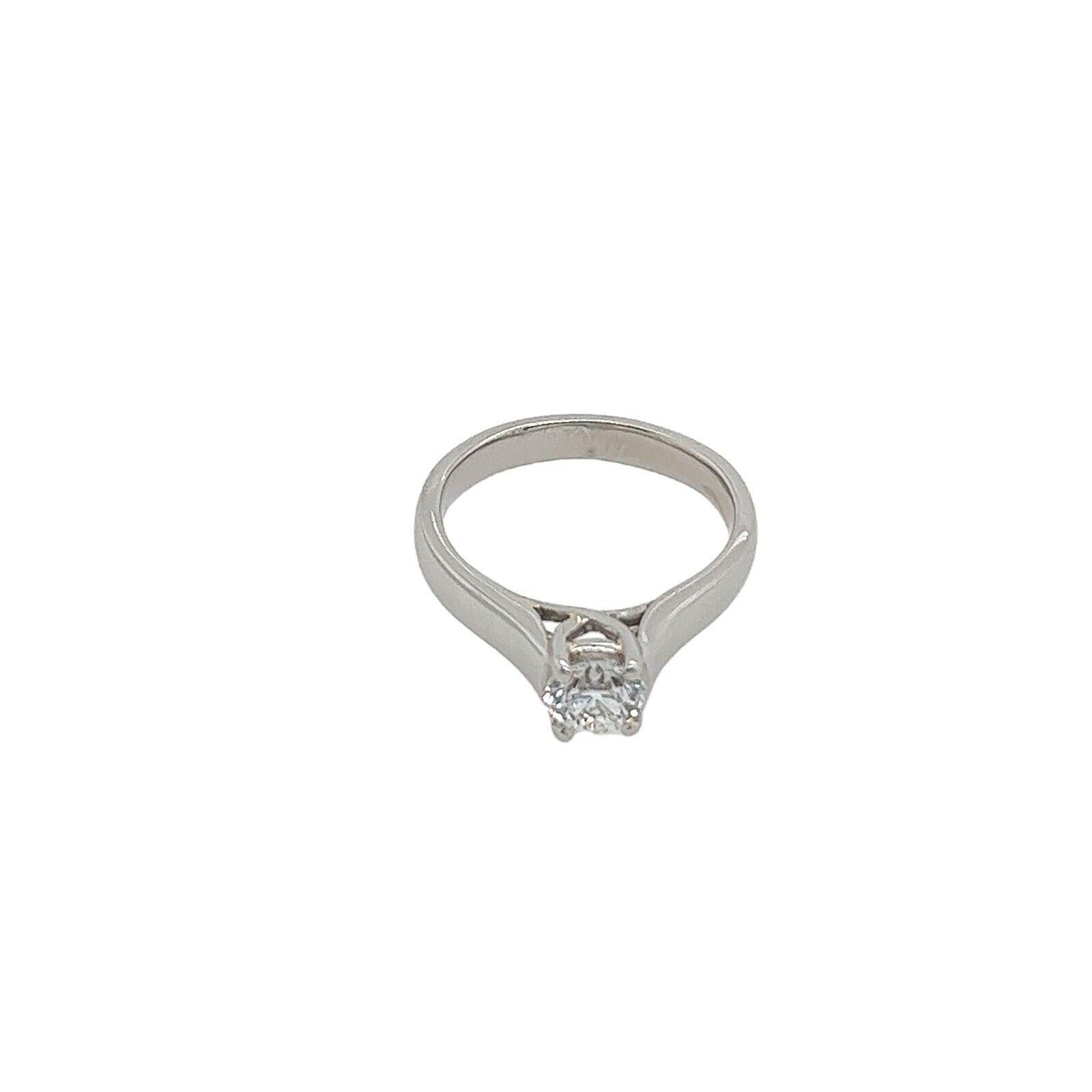 Round Cut Platinum Diamond Solitaire Ring Set with 0.51ct Round Brilliant Cut Diamond For Sale