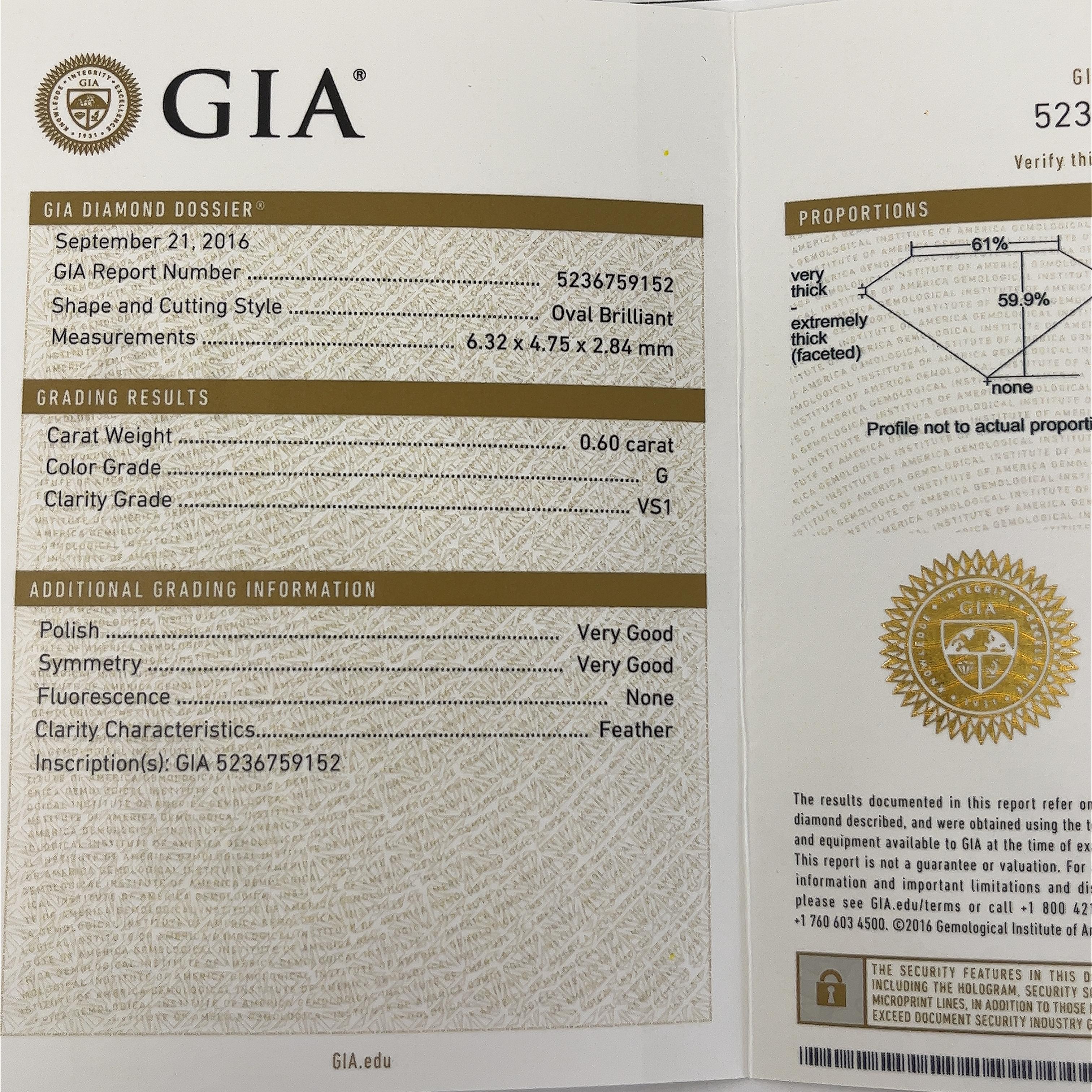 Bague solitaire sertie d'un diamant ovale de 0,60 carat G/VS1 certifié Gia Cert en vente 2