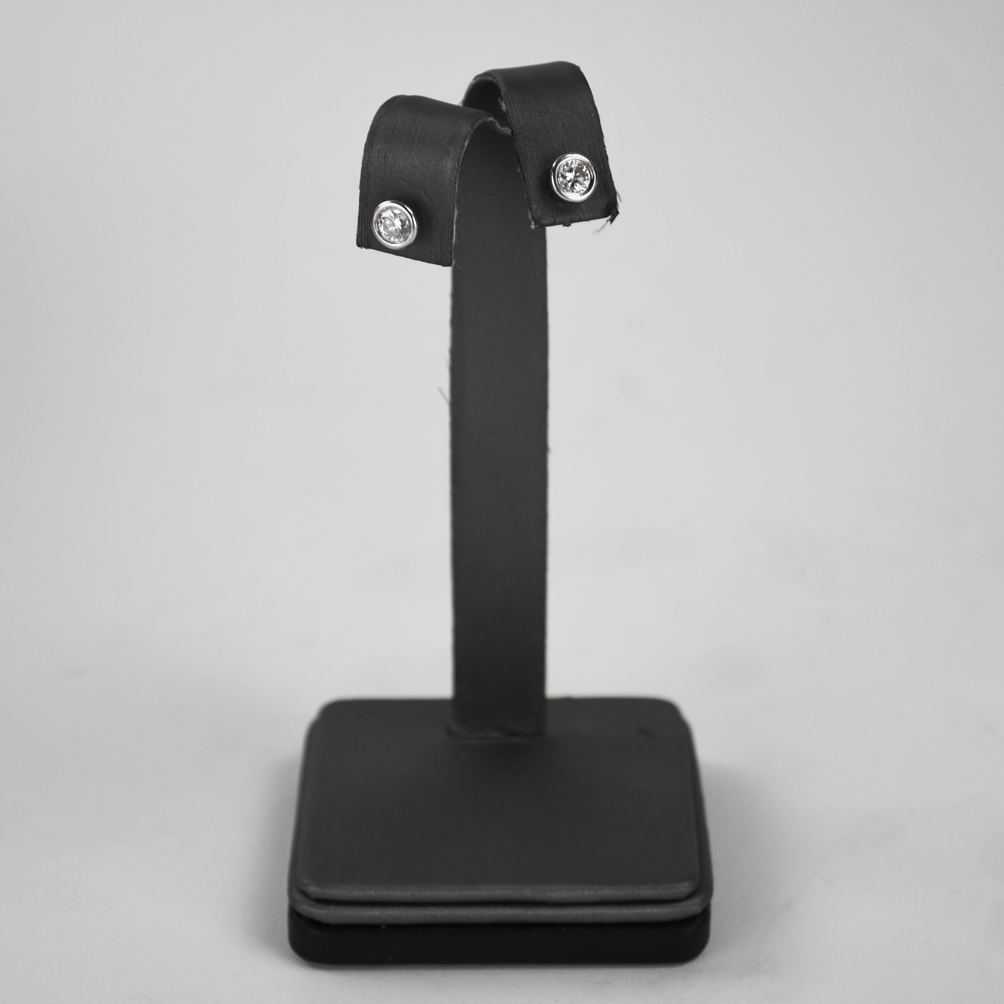 Boucles d'oreilles en platine avec diamant 0.60ct Unisexe en vente