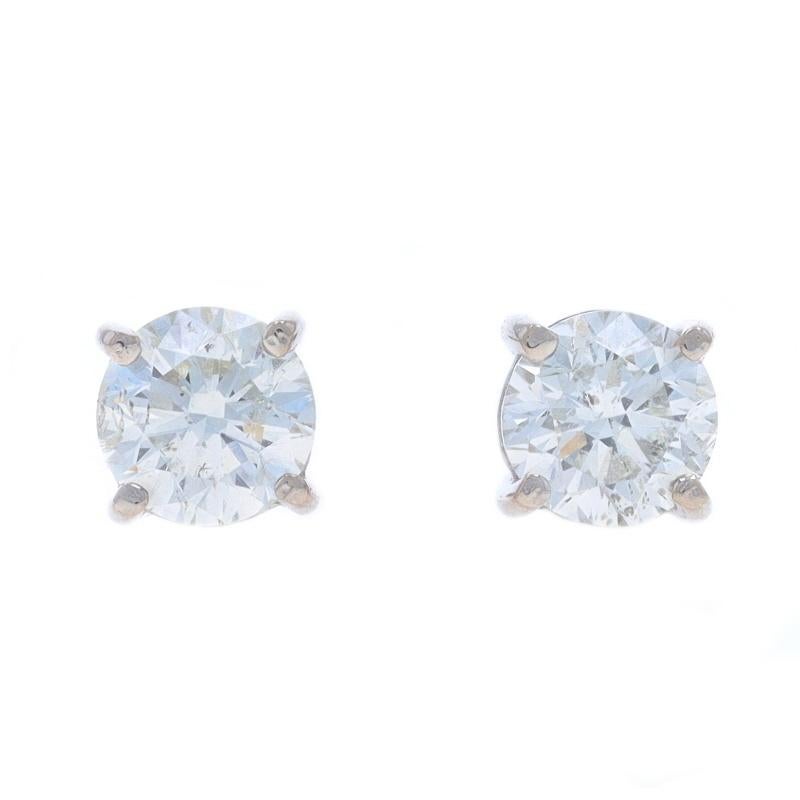 Metal Content: 950 Platinum

Stone Information
Natural Diamonds
Carat(s): 1.30ctw
Cut: Round Brilliant
Color: I - J
Clarity: SI2 - I1

Total Carats: 1.30ctw

Style: Stud
Fastening Type: Pierced Screw-On Closures

Measurements
Tall: 7/32