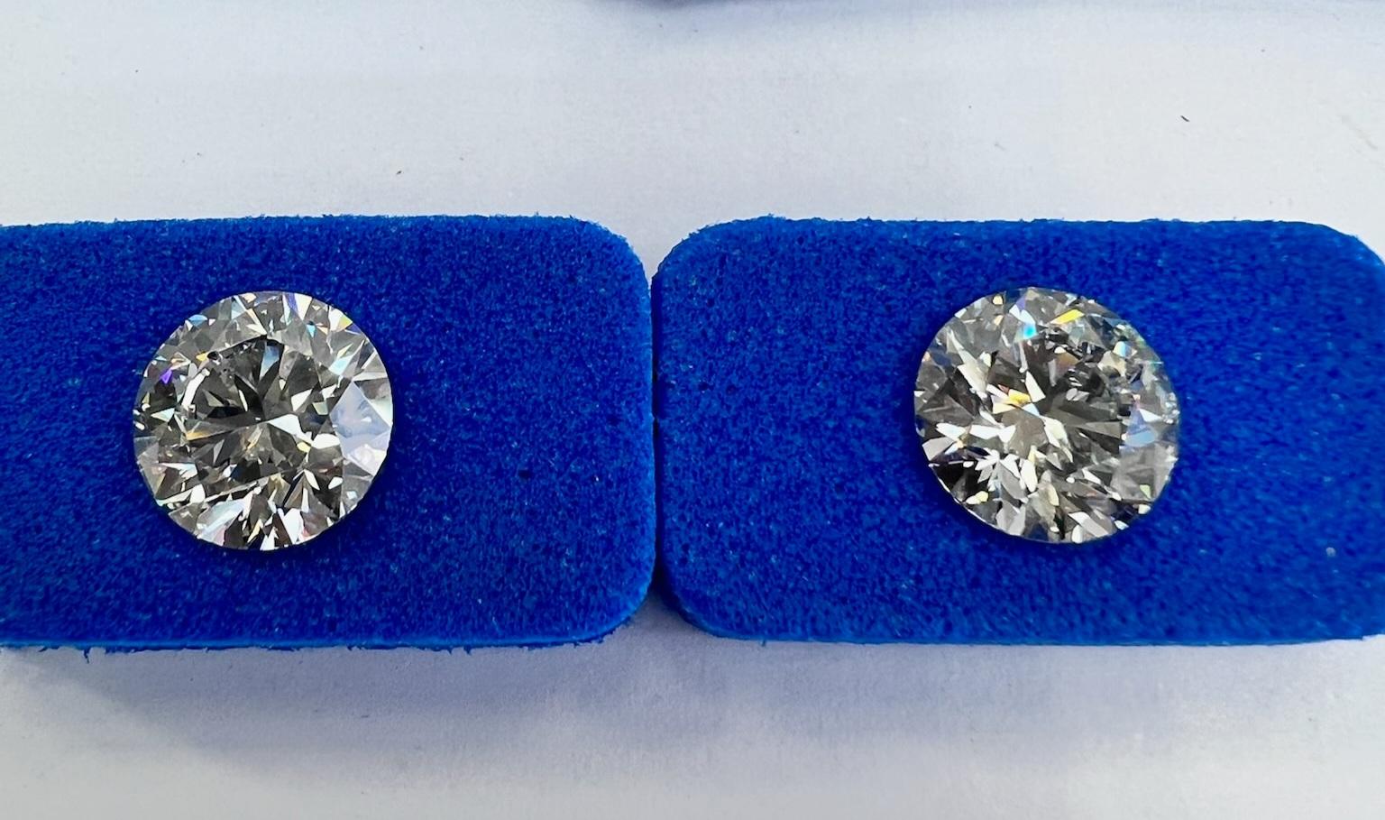 14kt White Gold Diamond Studs, GIA Lab-Grown, 5.00 cttw, Perfect Match, E/VS2, Ideal Cut. 

These earrings feature two perfectly matched GIA-certified diamonds. Both diamonds are graded E in color and VS2 in clarity, and they come with full grading