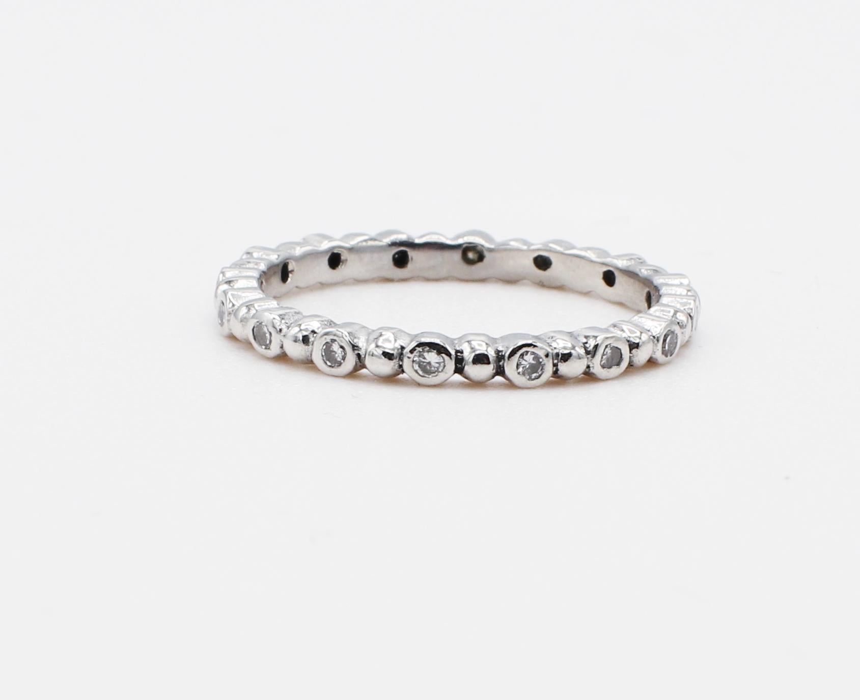 Platinum Natural Diamond Thin Eternity Band Stackable Ring Size 6.5
Metal: Platinum
Weight: 2.94 grams
Diamonds: Approx. .16 CTW G VS round brilliant cut natural diamonds
Size: 6.5 (US)
Width: 1.8 MM
