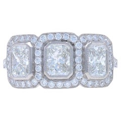 Platinum Diamond Three-Stone Halo Ring - 950 Radiant 2.11ctw Engagement