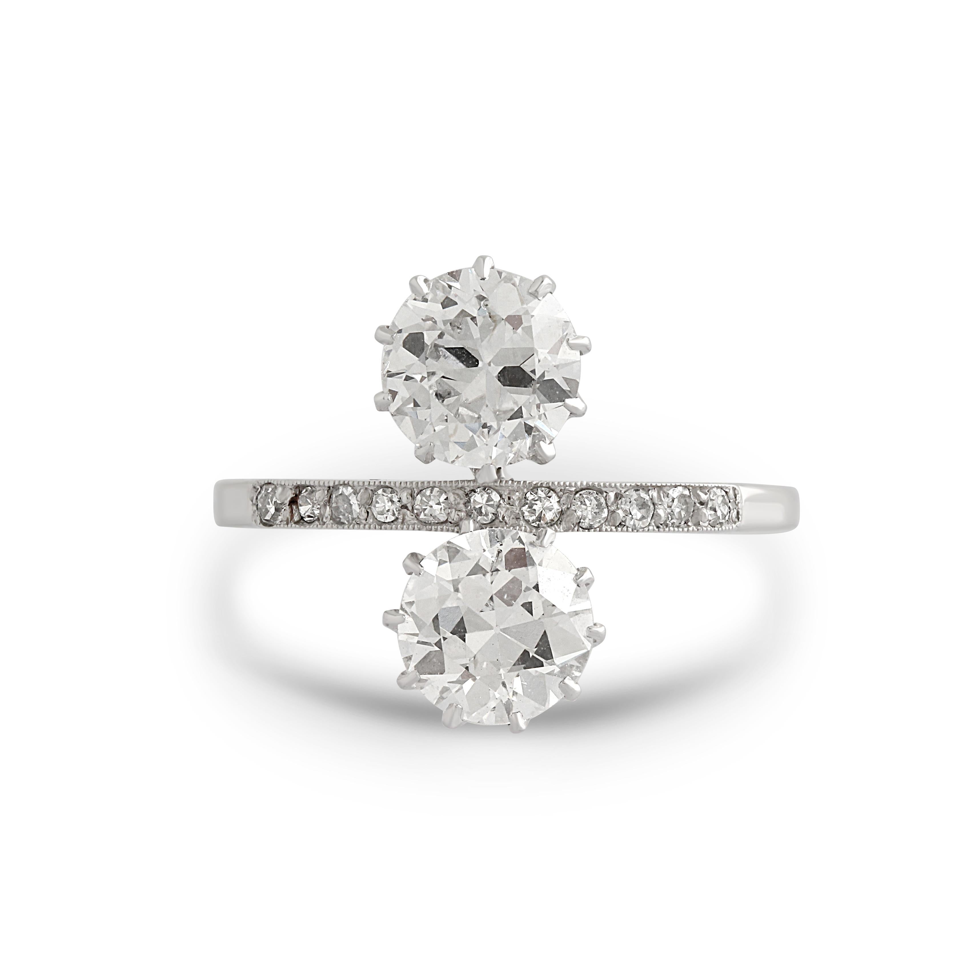 A platinum and diamond toi et moi ring. Toi et moi is the French for you and me and the style symbolises the coming together of two people in love by two gemstones resting beside one another.

This ring is set with approximately 1.90 carats of