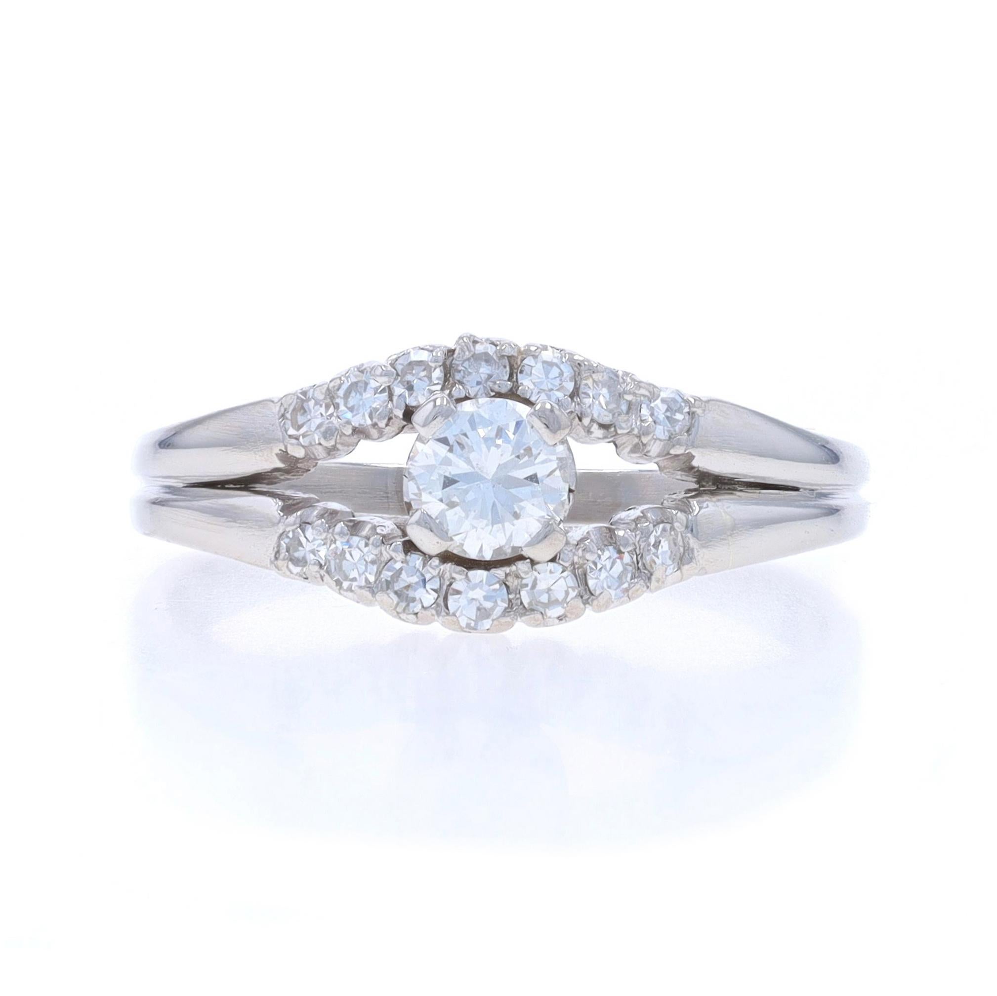 Size: 7
Sizing Fee: Up 2 sizes for $40 or Down 1 size for $30

Era: Vintage

Metal Content: Platinum

Stone Information

Natural Diamond
Carat(s): .26ct
Cut: Round Brilliant
Color: H
Clarity: SI1
Stone Note: (solitaire)

Natural Diamonds
Carat(s):