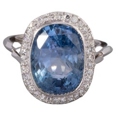 Platinum Diamonds and 9.82 Carats Ceylan Sapphire Art Deco Ring