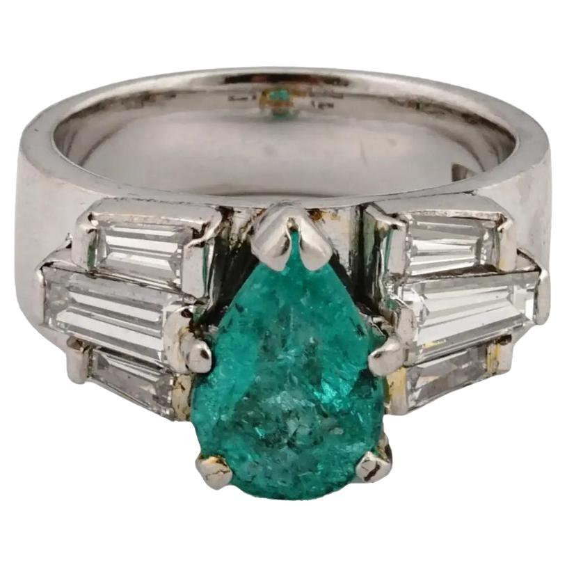 Platinum Diamonds And Emerald Engagement Ring