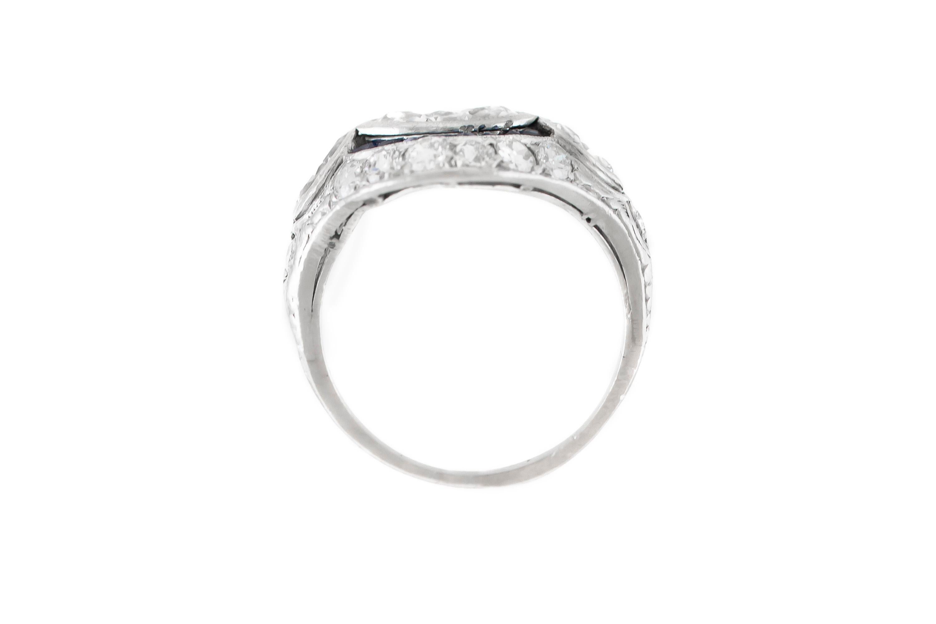 The ring is finely crafted in platinum with sapphires and diamonds weighing approximately total of 2.10 carat.
