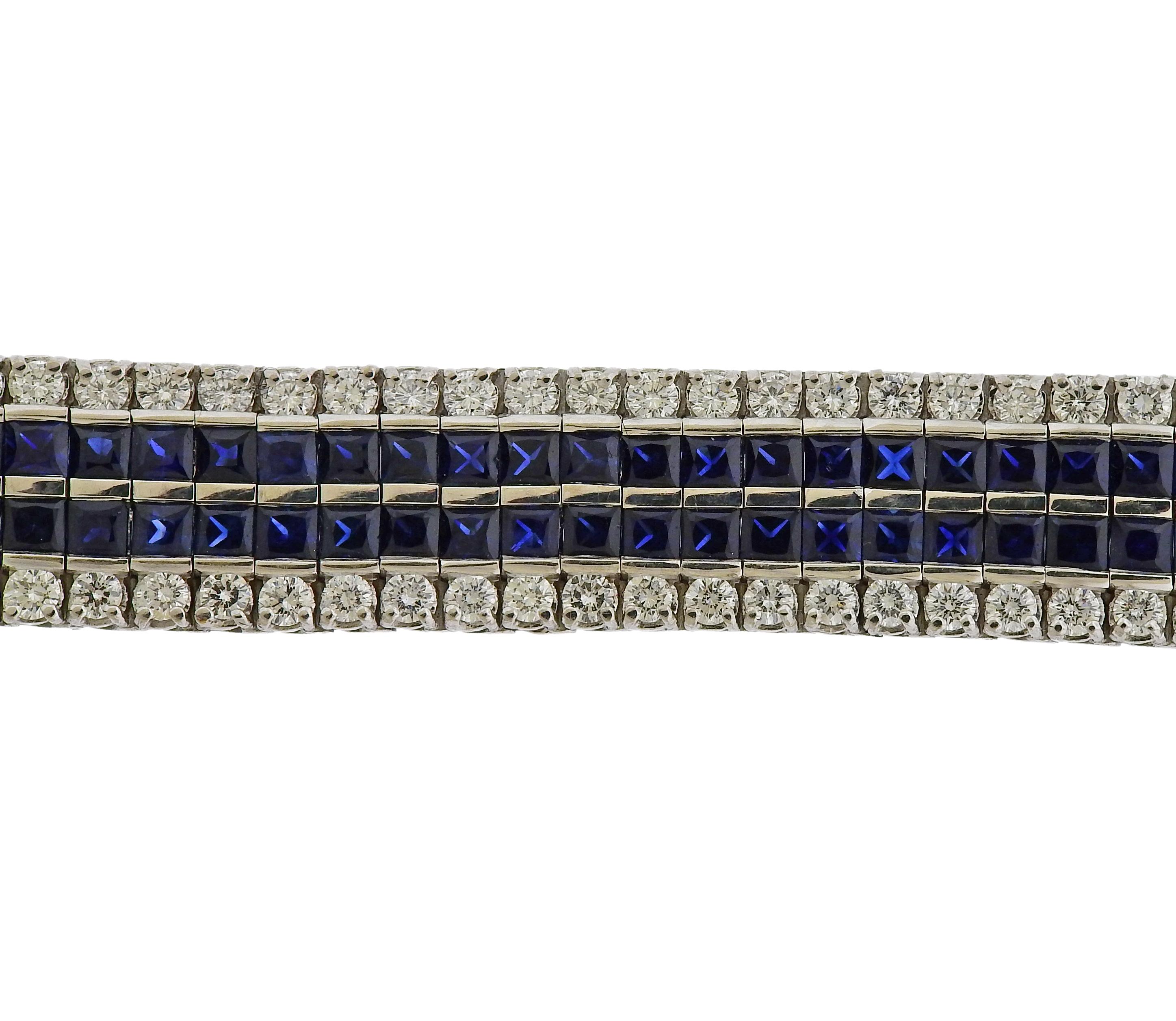 Platinum bracelet, featuring two rows of French cut blue sapphires and approx. 7.20ctw in diamonds. Bracelet is 7