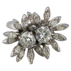 Bague en platine à double grappe de diamants floraux