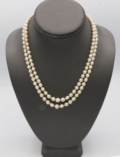 Platinum Double Row Pearl Necklace with Natural Diamond and Sapphire Clasp