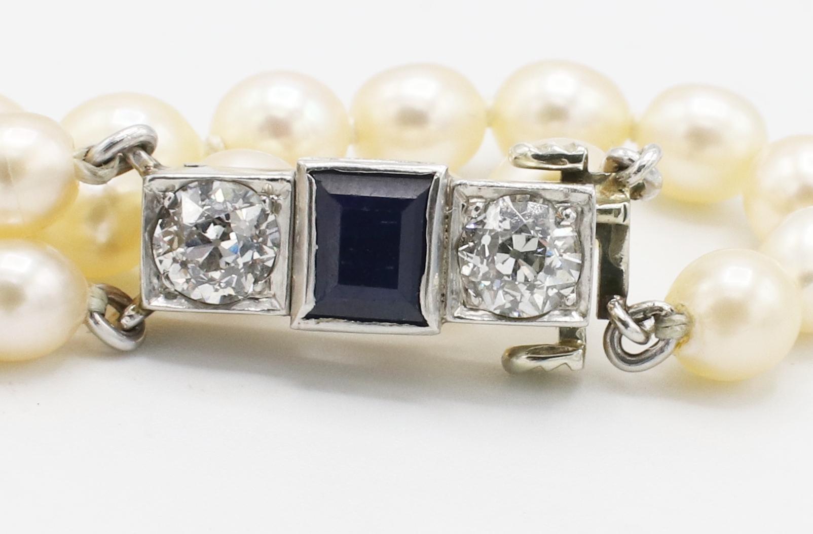 Art Deco Platinum Double Row Pearl Necklace with Natural Diamond and Sapphire Clasp