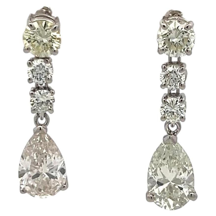 Platinum Drop Earrings with 4.25 Carat Round & Pear Diamonds J SI GIA For Sale