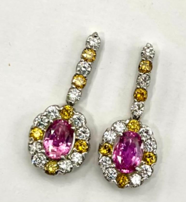 Contemporary Platinum Earring With a 1.83CT and 1.77Ct Pink Orange Sapphires For Sale