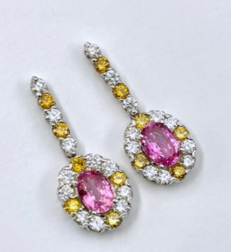 Oval Cut Platinum Earring With a 1.83CT and 1.77Ct Pink Orange Sapphires For Sale
