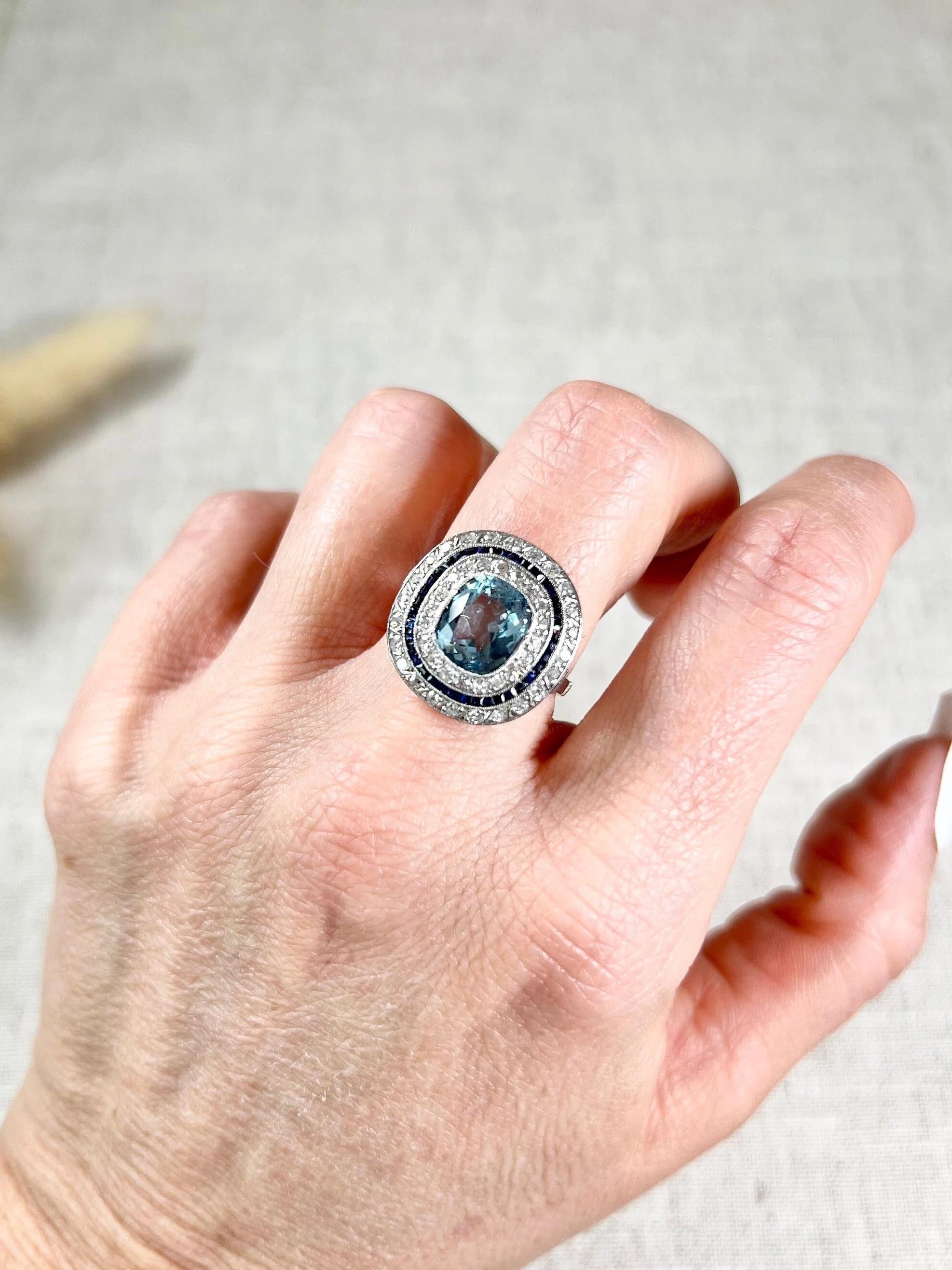 Platinum Edwardian Cushion Cut Aquamarine, Old Cut Diamond & Sapphire Halo Ring For Sale 7