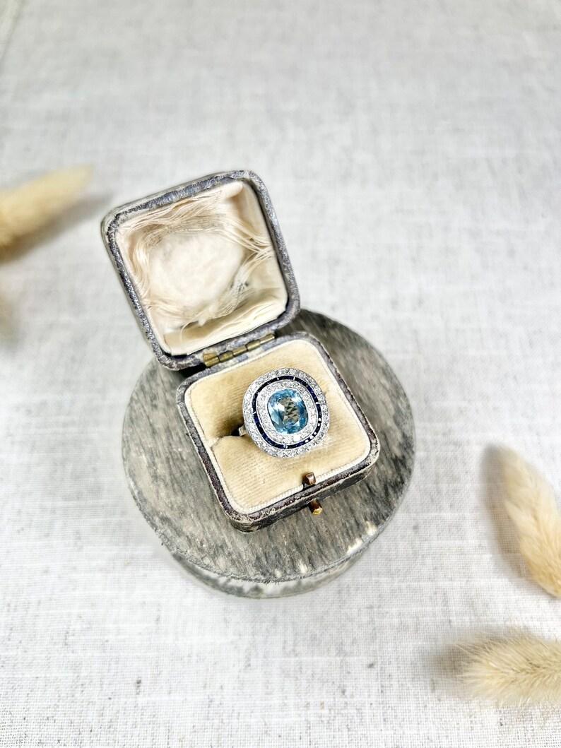 Platinum Edwardian Cushion Cut Aquamarine, Old Cut Diamond & Sapphire Halo Ring For Sale 5