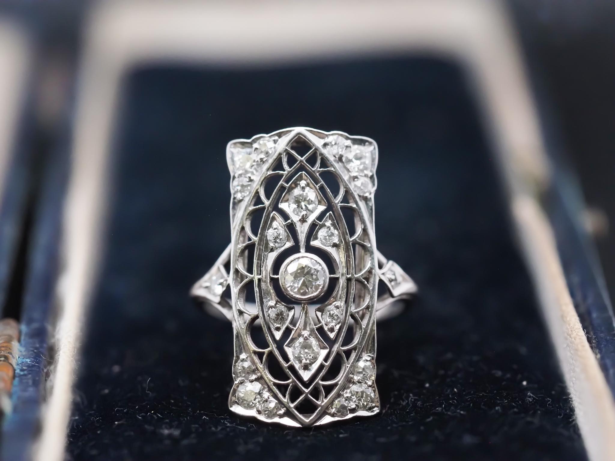 Year: 1920s
Item Details:
Ring Size: 5.75 (Sizable)
Metal Type: Platinum [Hallmarked, and Tested]
Weight: 4.3 grams
Diamond Details: .50ct total weight, old European cut diamonds, G Color, VS Clarity
Band Width: 1.4mm
Condition: Excellent