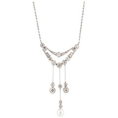 Antique Belle Époque Triple Drop Diamond and Pearl Lavalier in Platinum