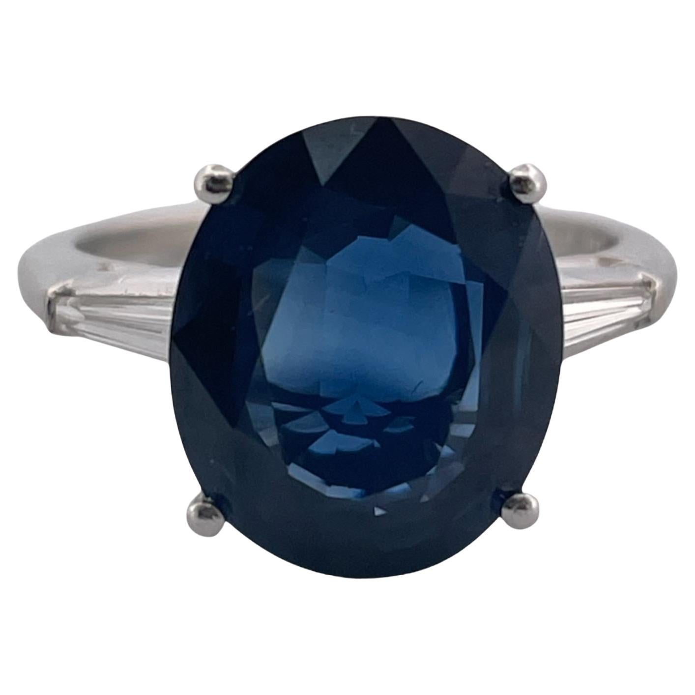 Platinum Elegance Sapphire Ring with Tapered Baguette Diamonds For Sale