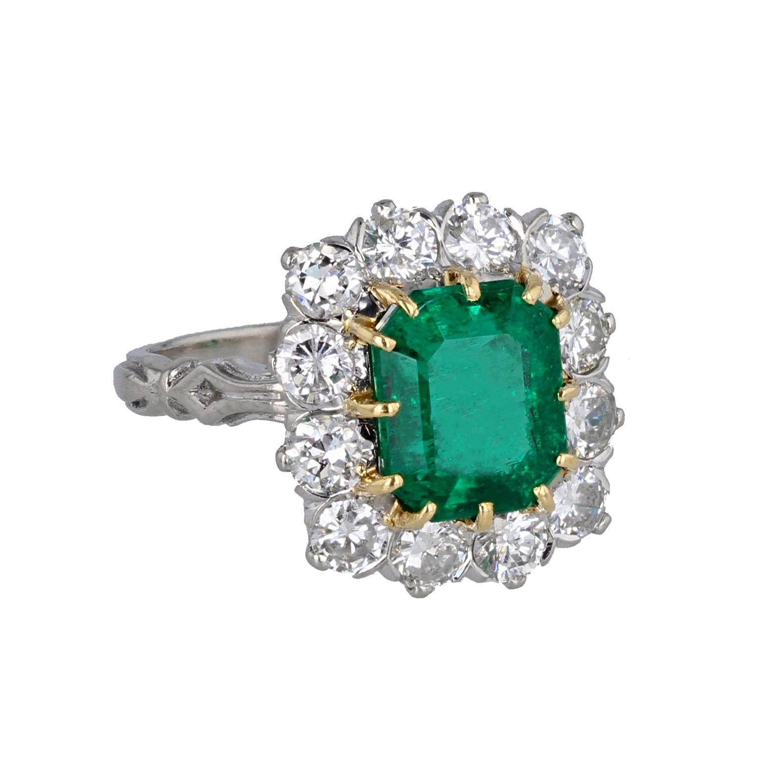 Edwardian Platinum Emerald Diamond Cluster Ring For Sale