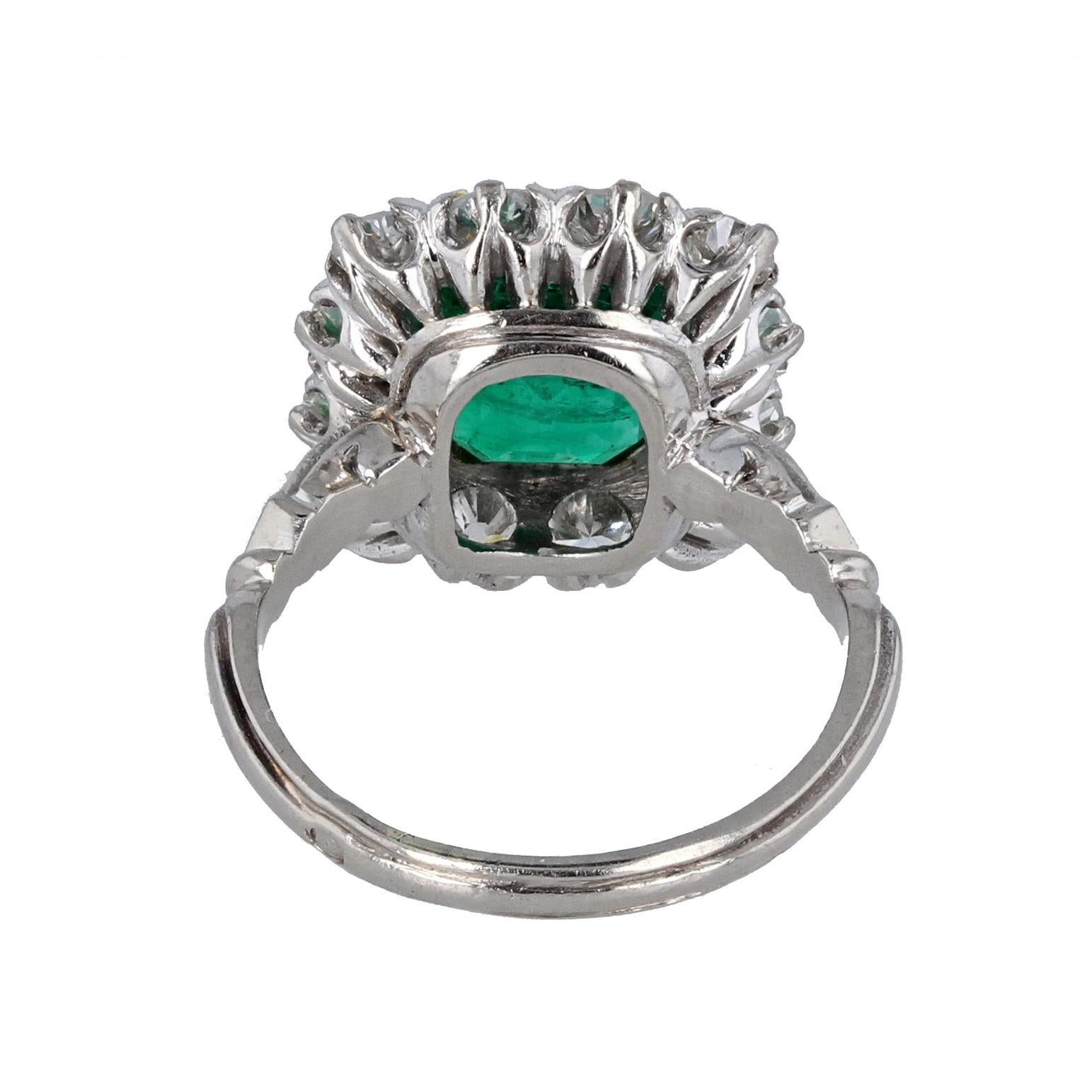 Platinum Emerald Diamond Cluster Ring In Excellent Condition For Sale In Newcastle Upon Tyne, GB