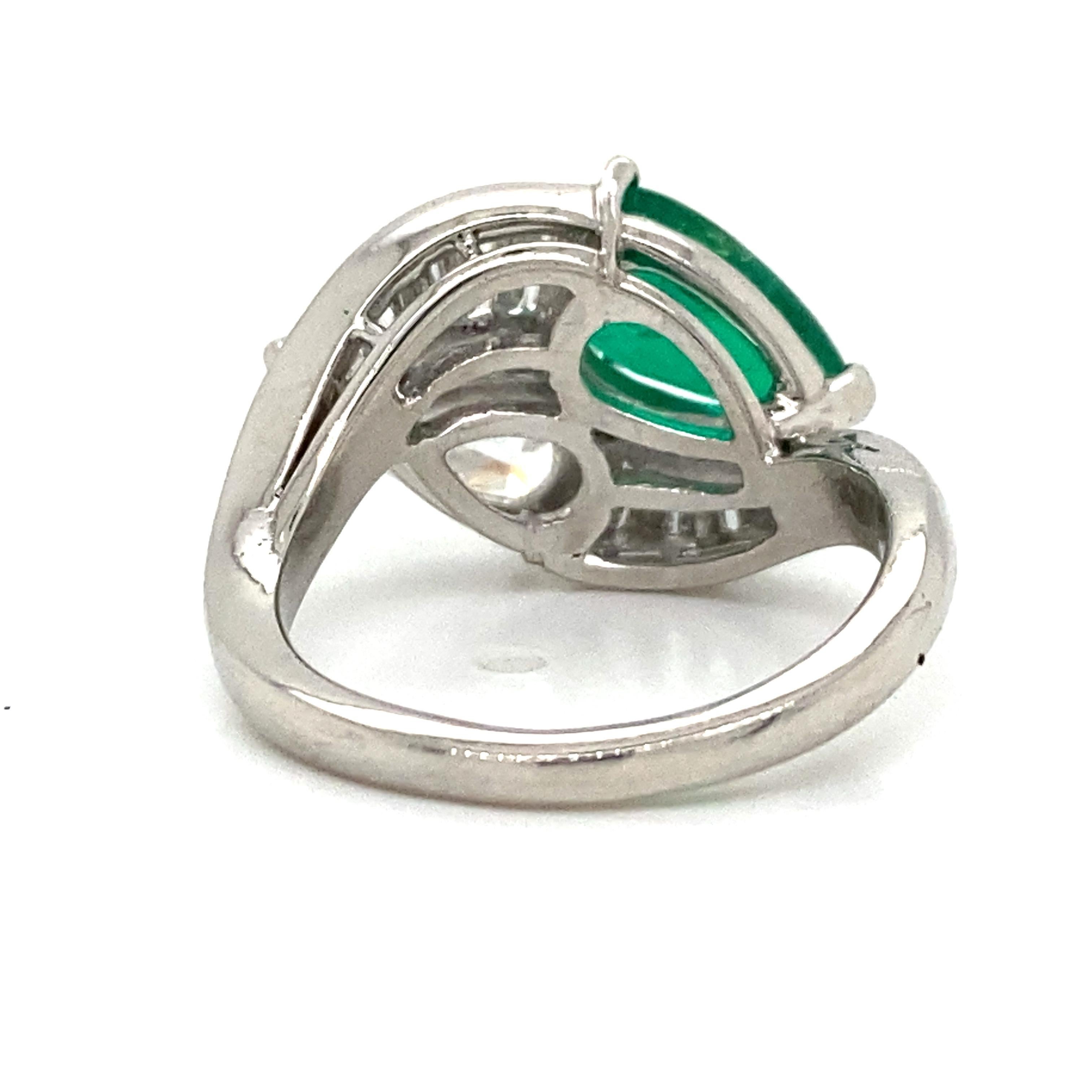 Women's Platinum Emerald and Diamond Bypass Ring