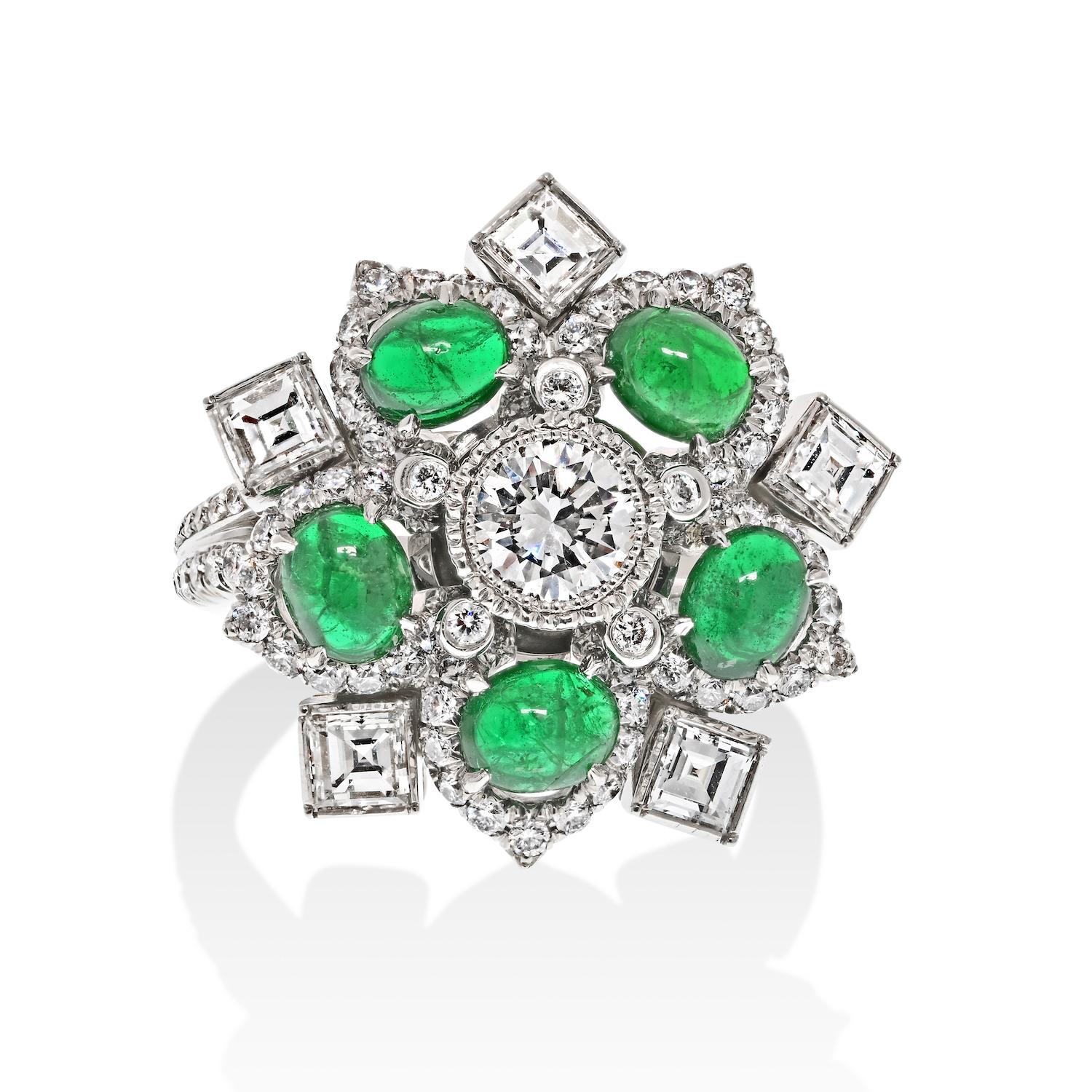 Elegance in Bloom: The Handmade Platinum Entourage Diamond and Cabochon Cut Green Emerald Ring.

Behold the exquisite charm of this handmade platinum ring, a captivating blend of diamonds and cabochon-cut green emeralds, all woven into a delightful