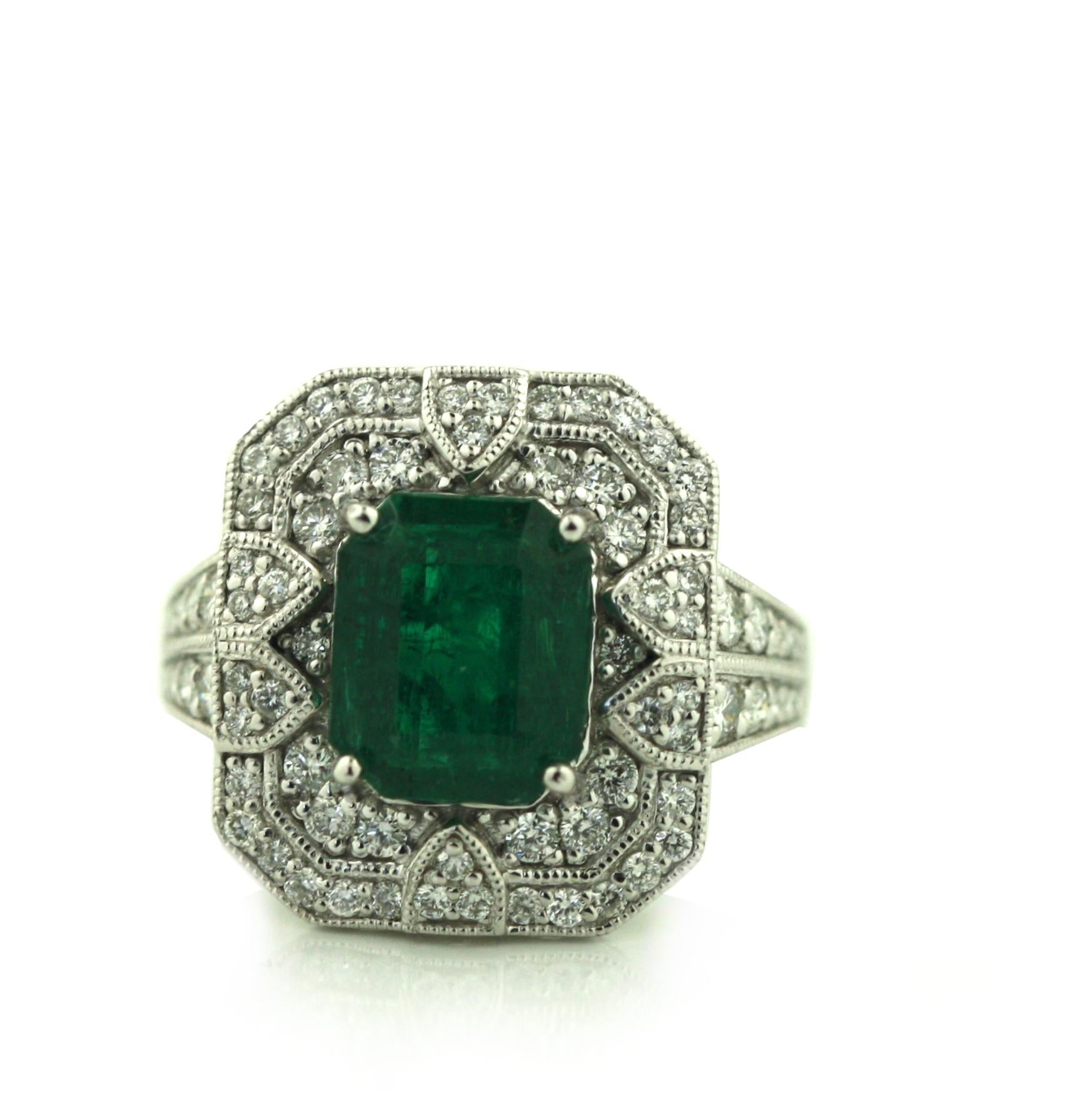 Platinum Emerald and Diamond Ring  
Designed as three tired rows, totaling approximately 8.11 carats 
Featuring a GIA certified, octagonal-shaped Emerald  
Weighing 3.50 carats  
Measuring 9.67 x 8.03 x 5.79 mm 
Ring Size 7 
Total Weight 10.3 grams 