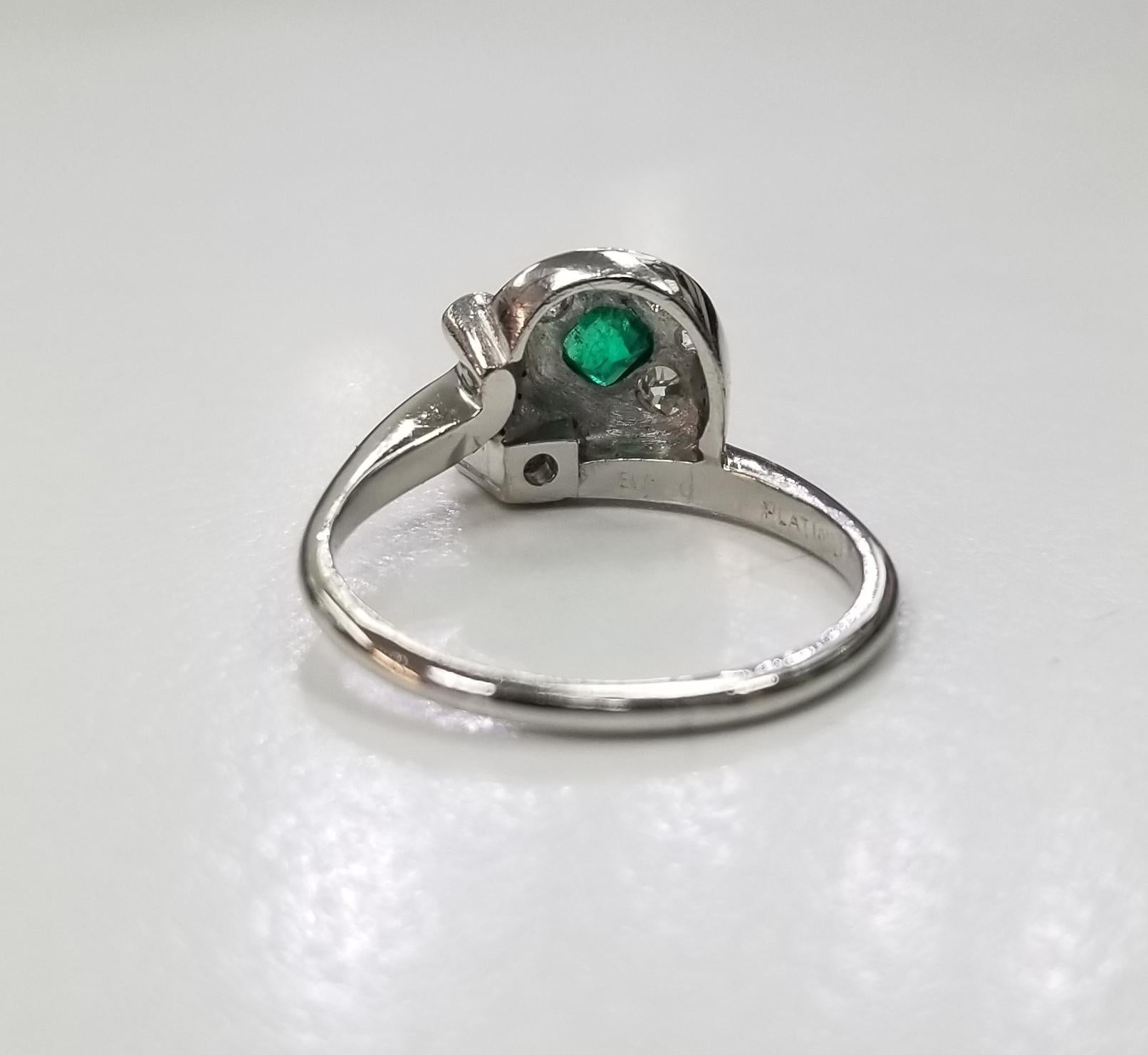 Contemporary Platinum Emerald and Diamond Ring For Sale