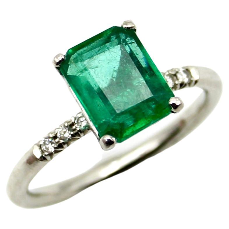 Platinum Emerald and Diamond Solitaire Ring For Sale