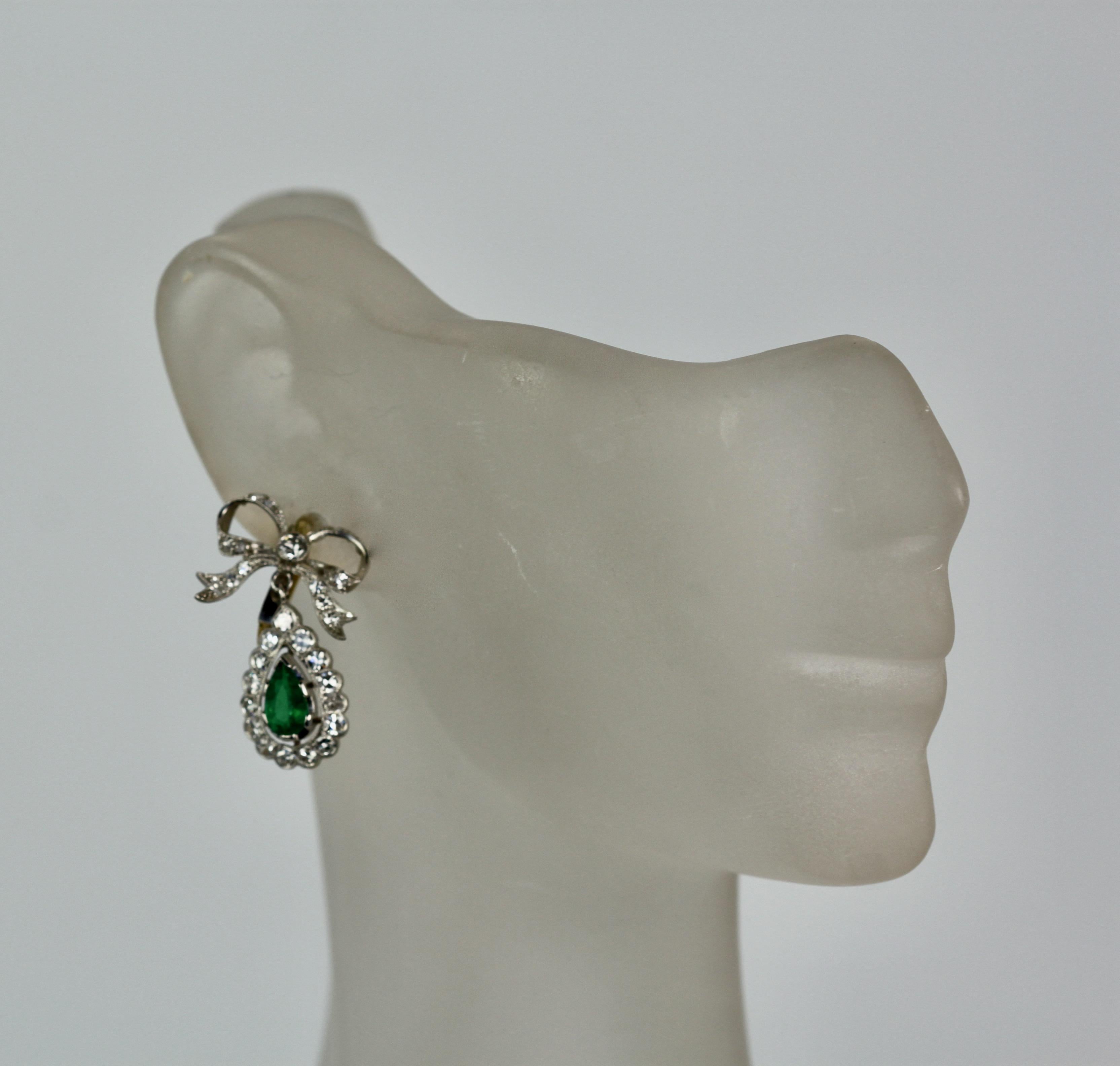 Emerald Cut Platinum Emerald Diamond Bow Earrings  For Sale