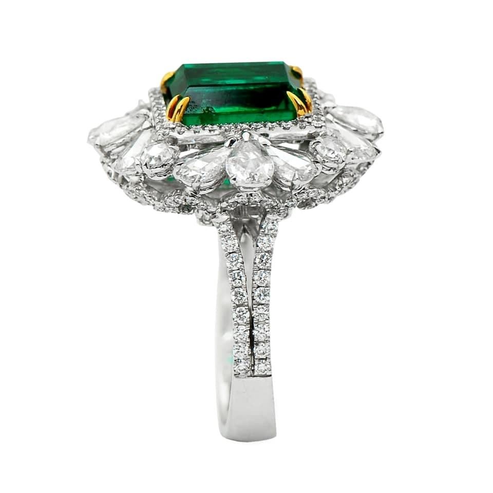 Platinum emerald cocktail ring from Laviere's Viridian Collection.
The ring is set with 3.8 carat Russian Emerald and adorned by 2.89 carat of fancy shape diamonds. 
Gross Weight of the ring: 12.30 grams.
The ring is accompanied by IGI and Laviere