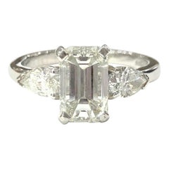 Platinum Emerald Cut and Pear Shape Diamond Three-Stone Ring