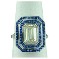Platinum Emerald Cut Diamond and Blue Sapphire Ring
