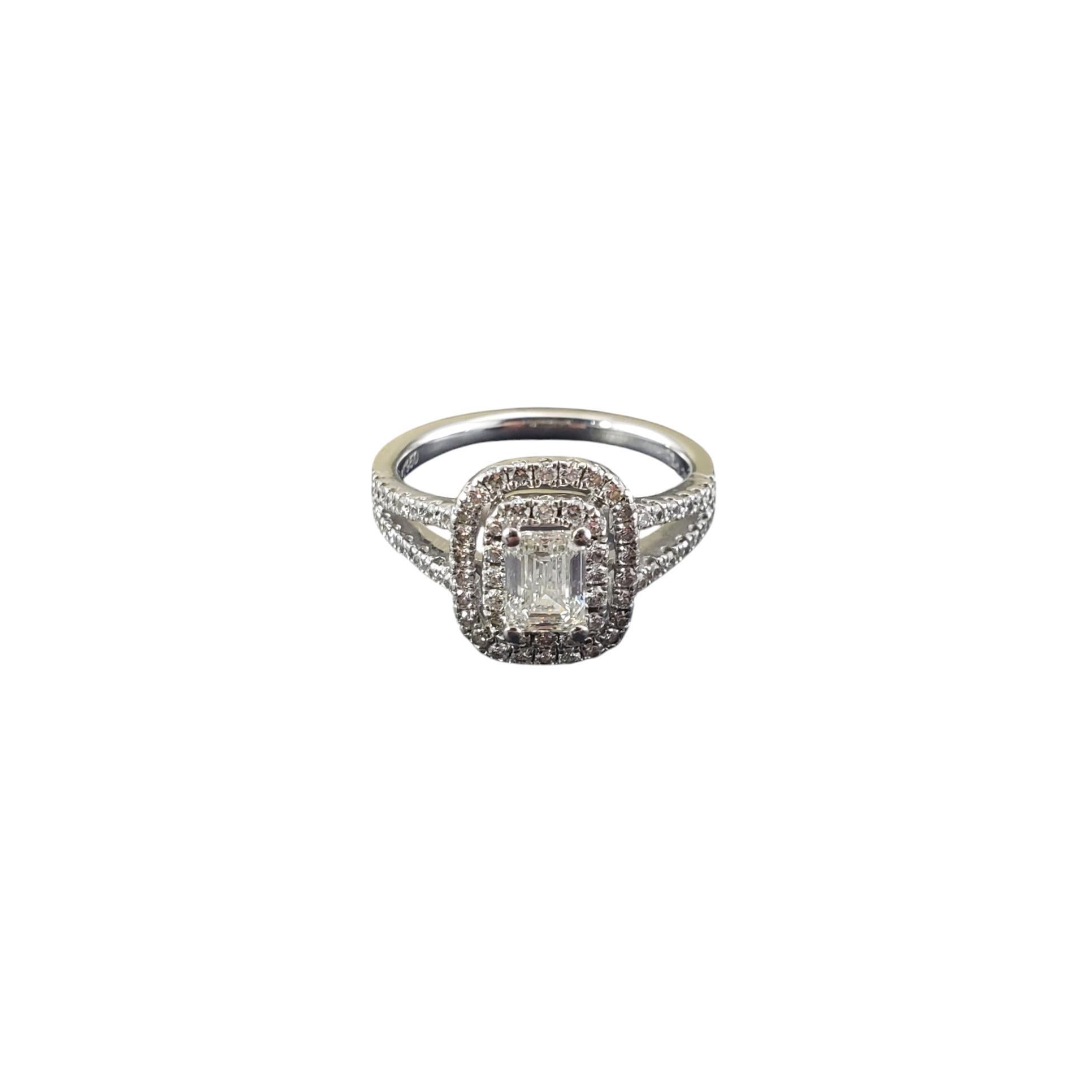 Platinum Diamond Double Halo Engagement Ring Size 7 JAGi Certified-

This sparkling platinum engagement ring features one emerald cut diamond in its center (.70 ct.) accented with 70 round brilliant cut diamonds in the double halo and split shank