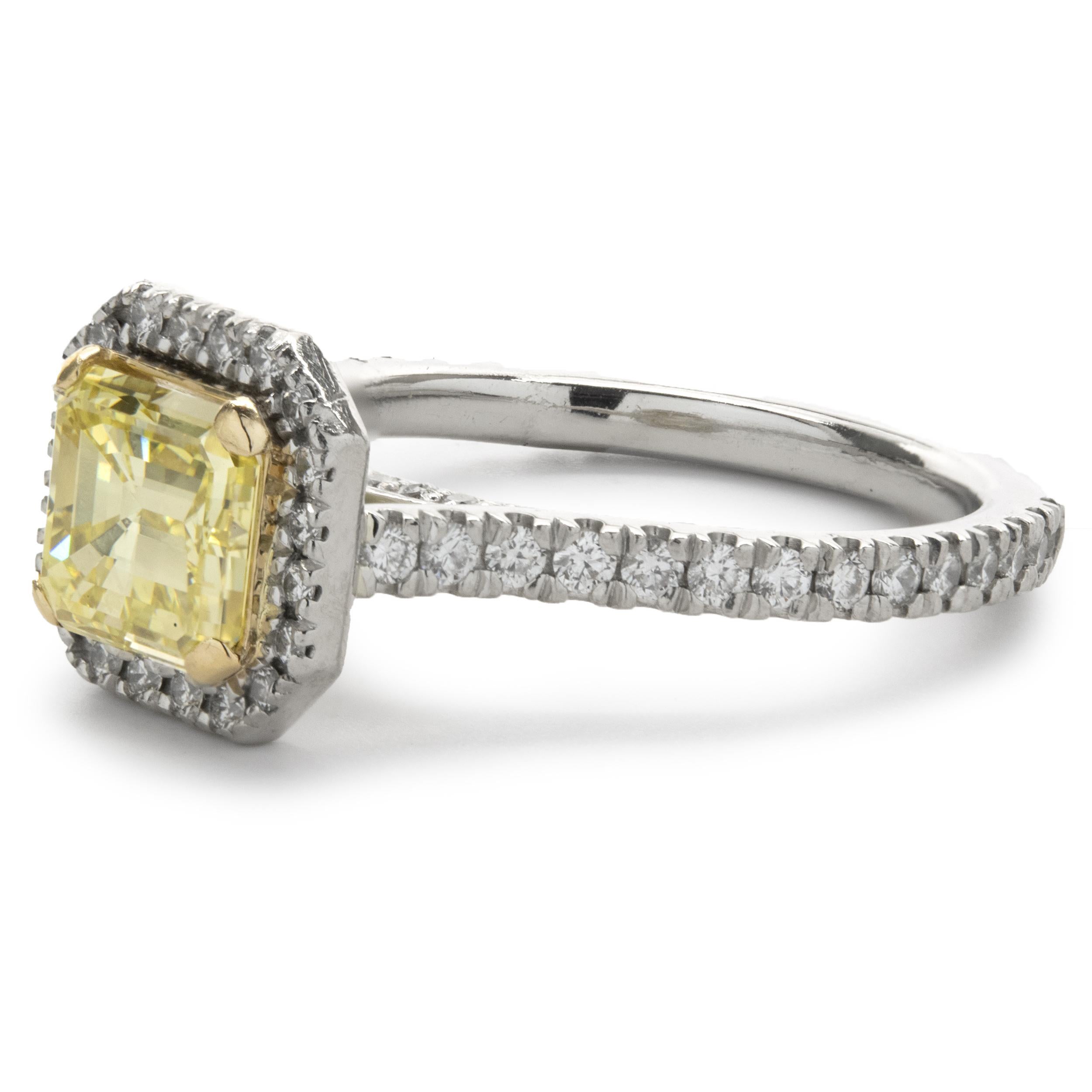 Designer: custom
Material: platinum
Diamond: 1 emerald cut = 1.39ct
Color: Fancy Intense Yellow
Clarity: VVS2
GIA: 2155585501
Diamond: 64 round cut = 0.64cttw
Color: G
Clarity: SI1
Ring Size: 6 (please allow up to 2 additional business days for