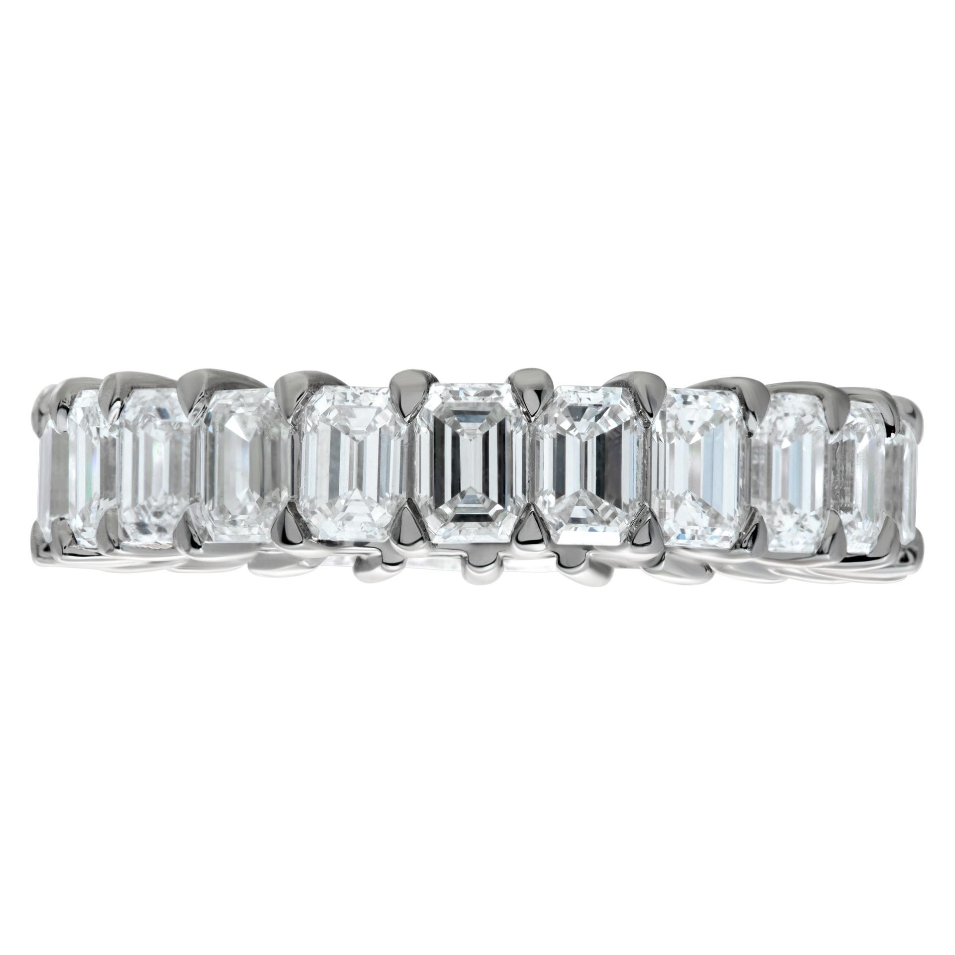 Emerald cut diamond eternity band 4.25 carats in G-H color, VS clarity diamonds set in platinum. Size 6.5, width 4.5mm.
