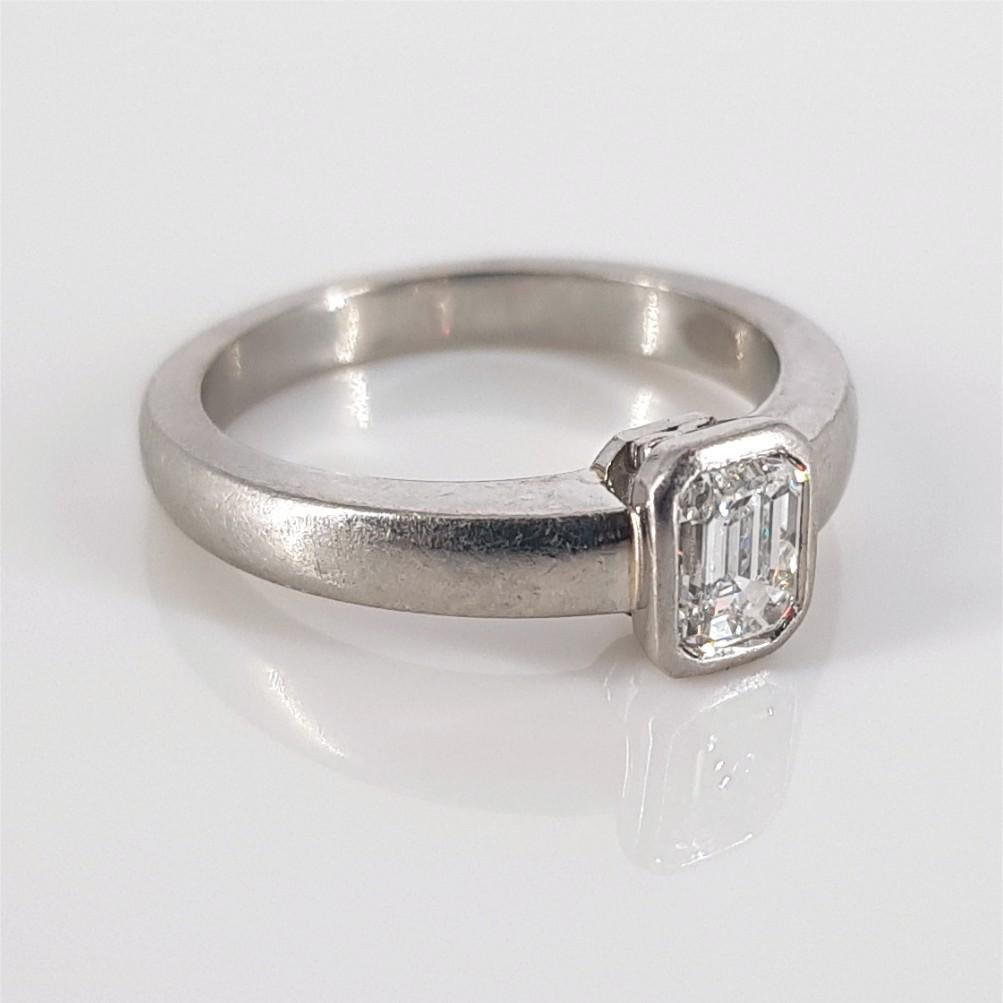 Women's or Men's Platinum Emerald Cut Diamond Ring For Sale