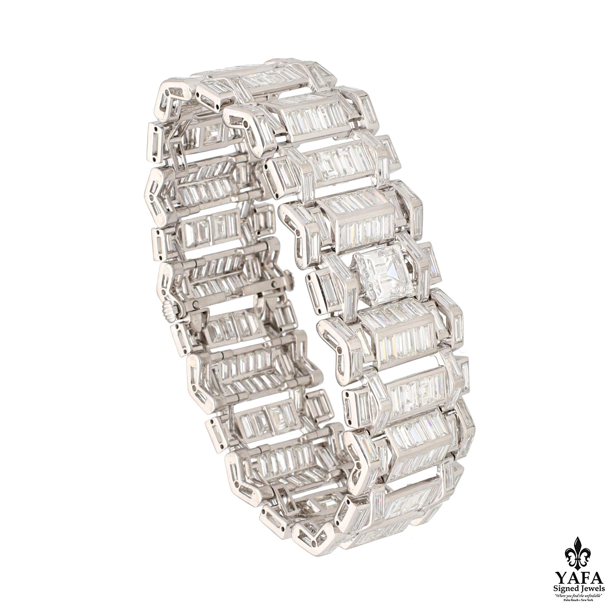 Crafted in platinum with precision and adorned with a magnificent display of diamonds totaling approximately an impressive 56 carats, this bracelet is a true embodiment of timeless beauty. The Art Deco design inspires timeless elegance. 3 Emerald