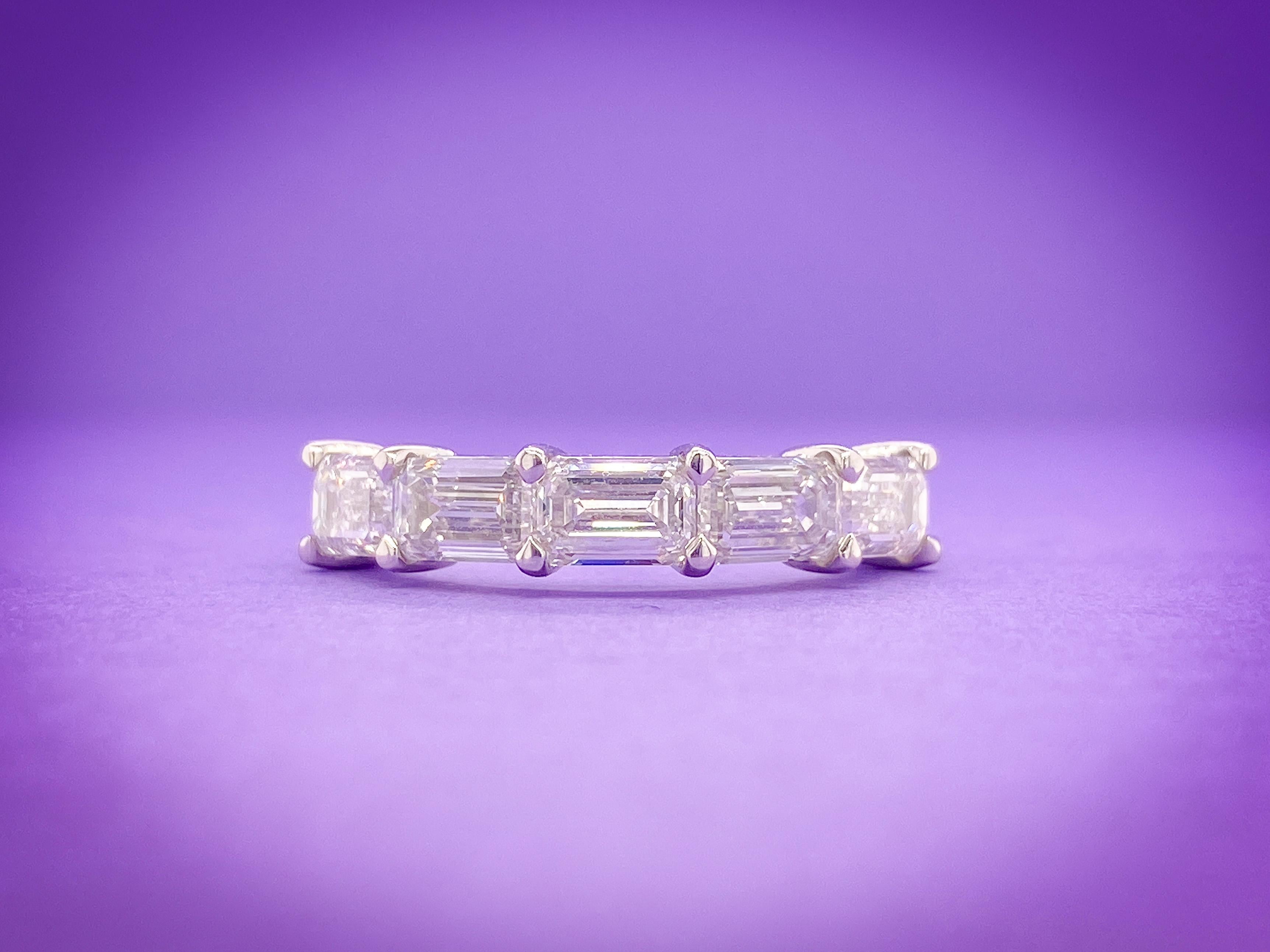 This Emerald Cut Horizontal Anniversary Band features 5 Emerald Cut Diamonds, totaling 2.45 Total Carat Weight. The stones are all GIA Certified D Color with VS Clarity, set Horizontally in a Platinum setting in Finger Size 6.5. 


Need a different
