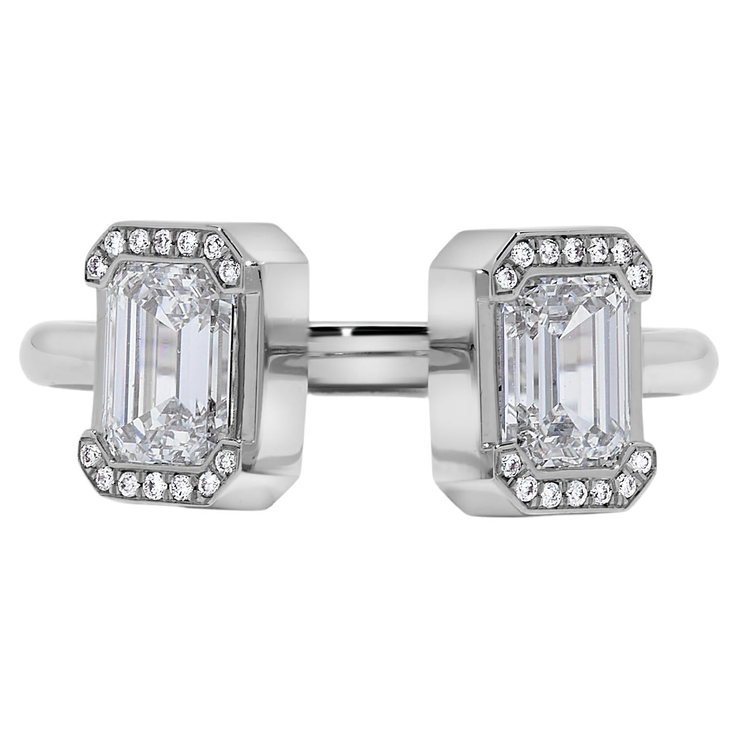 This two stone ring features two GIA certified diamonds weighing 0.70 and 0.71 carats both D VVS2 with 0.05 melees set in Platinum. Size 6. Resizable upon request. 
