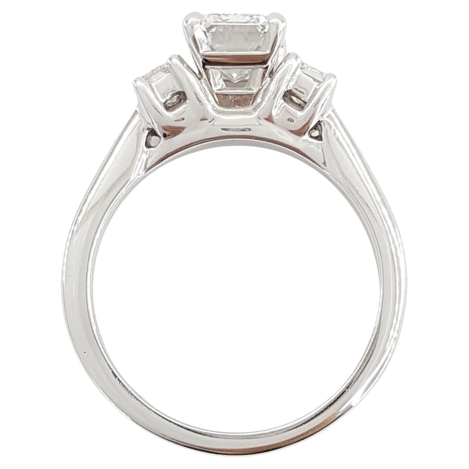 Modern Platinum Emerald Diamond Cut Three-Stone Engagement Ring