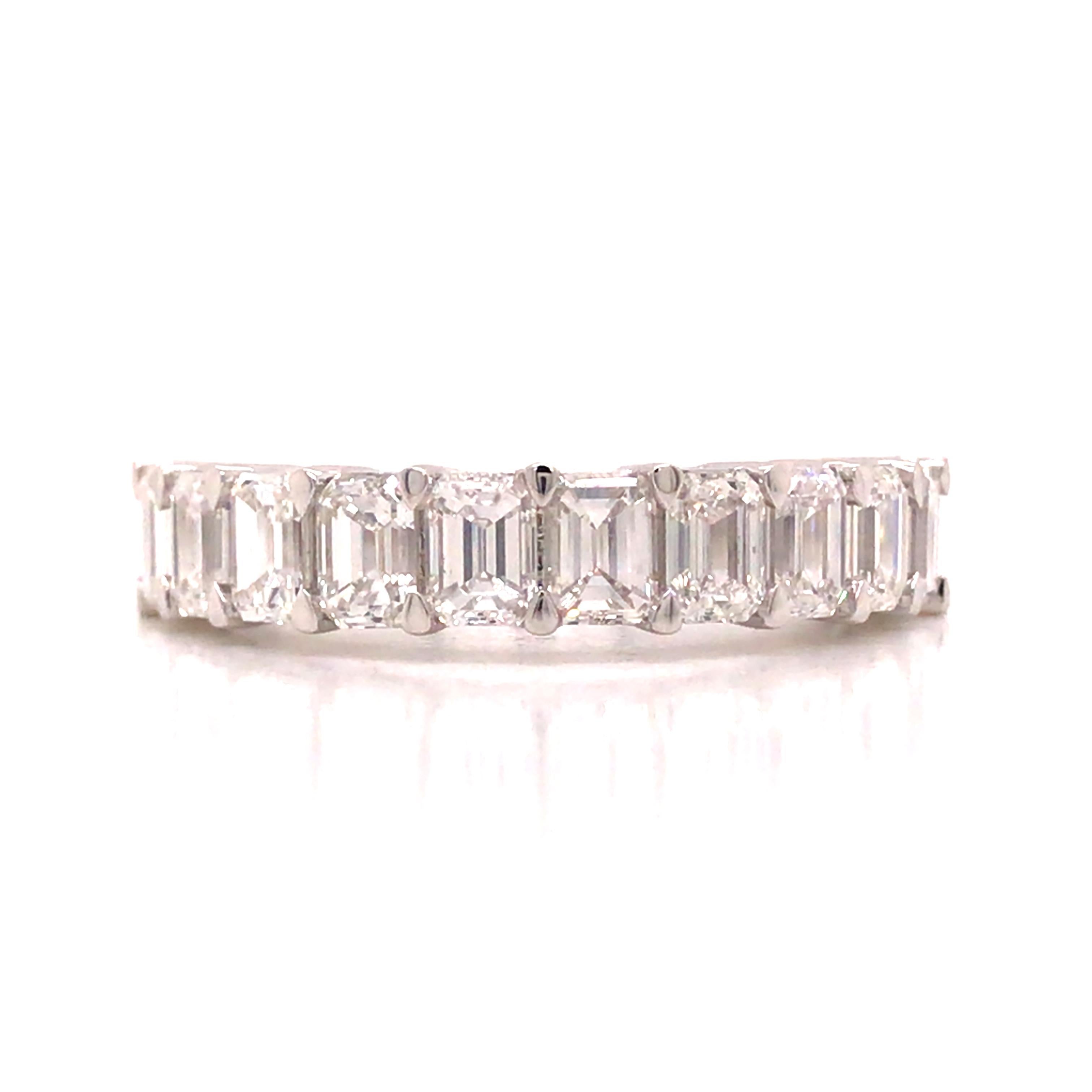 Emerald Cut Diamond Halfway Eternity Band in Platinum.   (10) Emerald Cut Diamonds weighing 1.95 carat total weight, G-H in color and VS-SI in clarity are expertly set.  The Ring measures 3/16 inch in width.  Ring size 6 1/2.  5.59 grams.