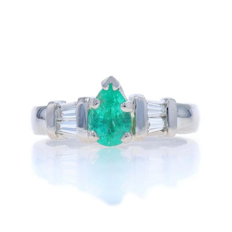 Size: 6 1/4
Sizing Fee: Up 1/2 a size for $50 or Down 1/2 a size for $50

Metal Content: Platinum

Stone Information

Natural Emerald
Treatment: Oiling
Carat(s): .59ct
Cut: Pear
Color: Green

Natural Diamonds
Carat(s): .16ctw
Cut: Baguette
Color: