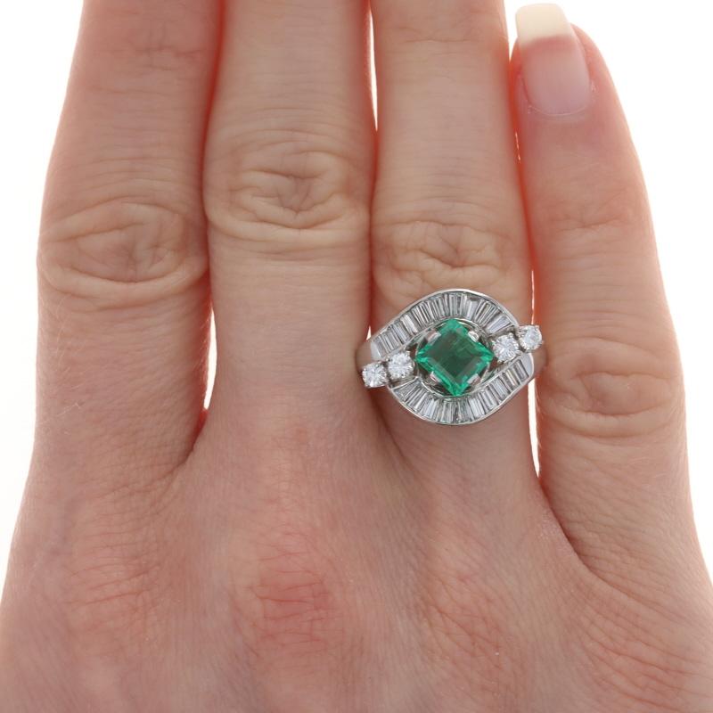 Size: 6 1/4
Sizing Fee: Up 2 sizes for $100

Era: Vintage

Metal Content: Platinum

Stone Information

Natural Emerald
Treatment: Oiling
Carat(s): 1.05ct
Cut: Square Step
Color: Green

Natural Diamonds
Carat(s): 1.28ctw
Cut: Baguette & Round