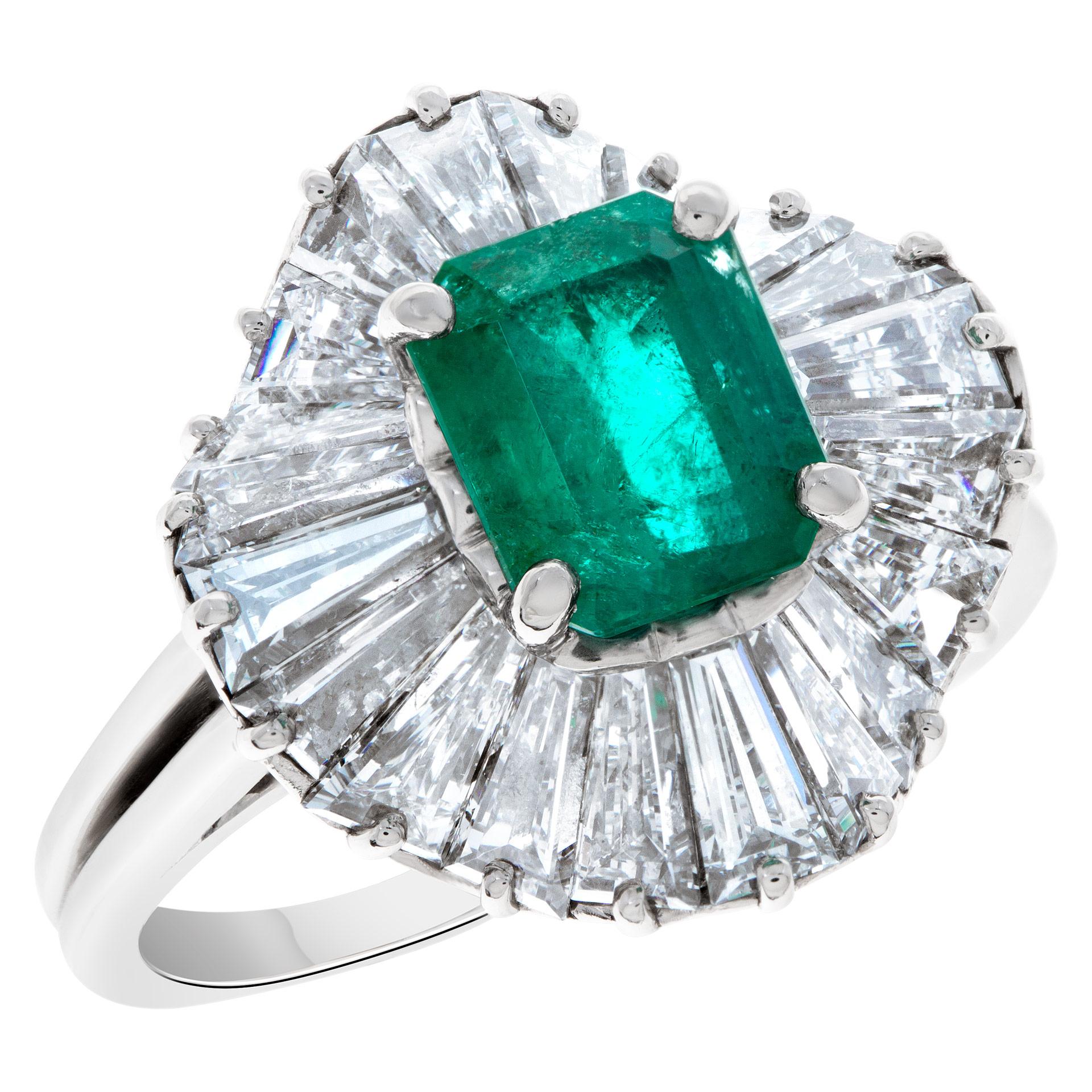Stunning Diamond and Emerald Platinum ring with 1.50 carat green emerald surrounded by 1.50 carats in baguette diamond accents G-H color, VS clarity. Size 6.5  This Diamond/Emerald ring is currently size 6.5 and some items can be sized up or down,