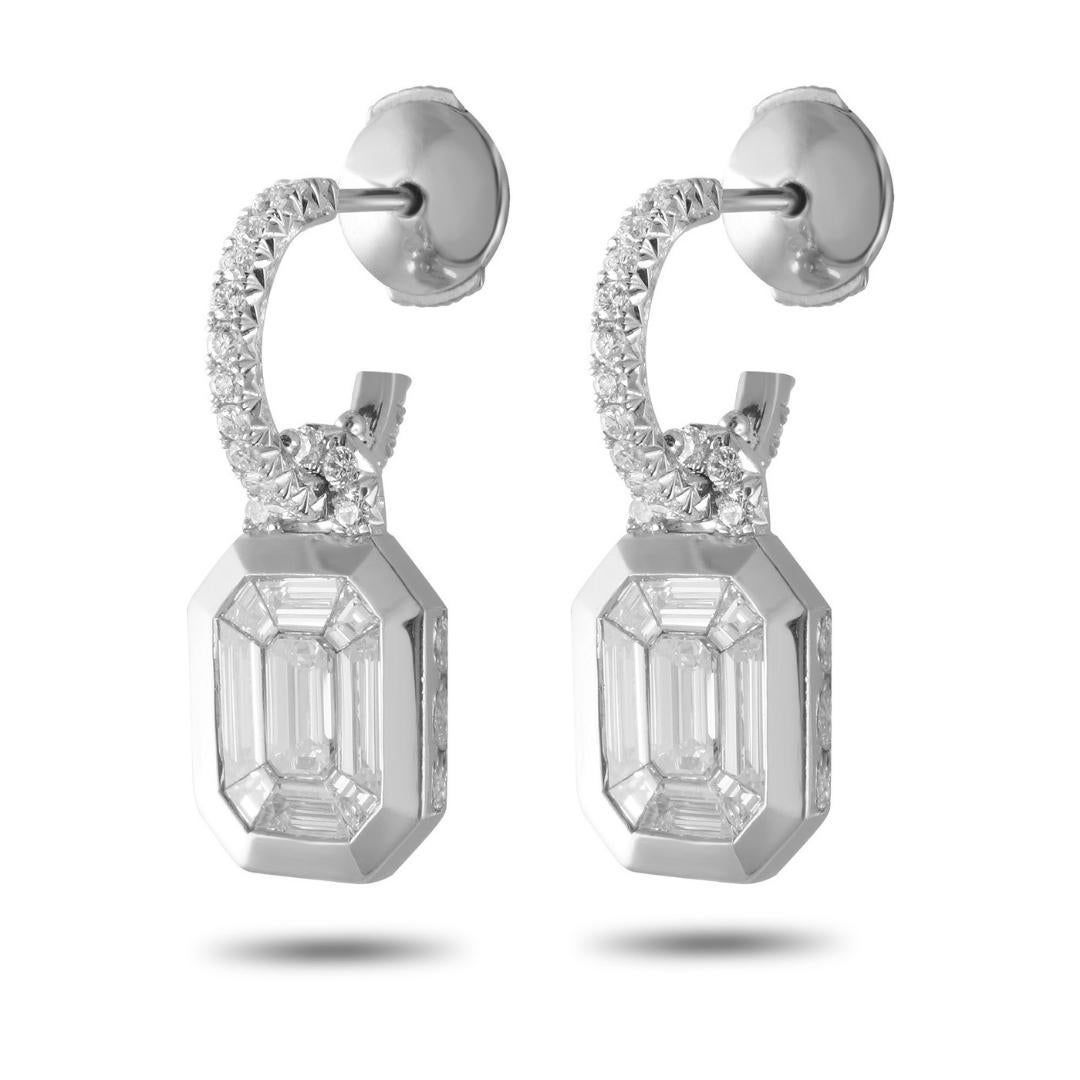 These timeless, classic and beautiful emerald illusion diamond earrings can easily become a family heirloom considering its quality design will stand the test of time. Each earring is set in platinum and contains 9 shaped baguette diamonds that are