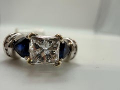 Platinum engagement diamond ring 1.50ct unique three stone design