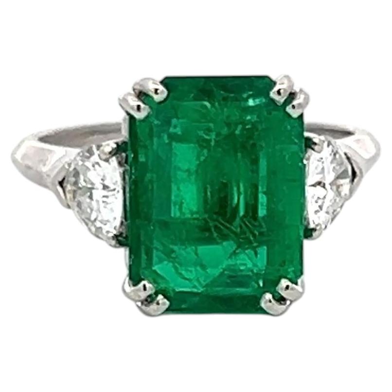 Platinum Engagement Ring with 0.6ct Triangular Diamonds 3.36 Ct Emerald GIA